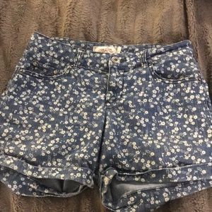 Blue shorts with small white flowers